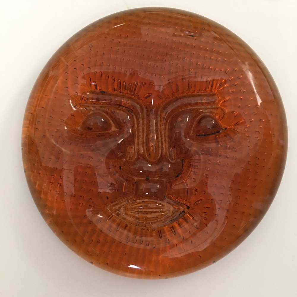 Amber Art glass flat paperweight sun face Fornasetti?